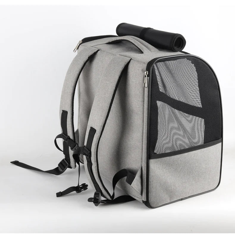 Pet carrier with adjustable shoulder strap and ergonomic handles