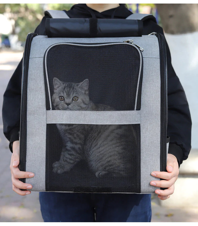 Pet carrier with adjustable shoulder strap and ergonomic handles