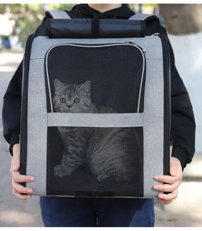 Pet carrier with adjustable shoulder strap and ergonomic handles